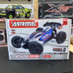Arrma Typhon Grom Is 4x4 Buggy Red / White.