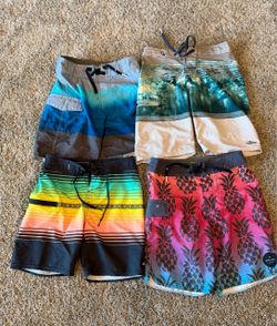 Boys board shorts/bathing suits Size 22 (fits size 4/5)