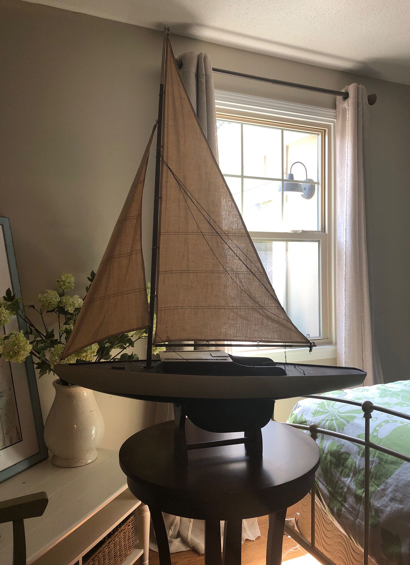 Model wooden sailboat.