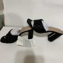 The sandals in the images are the Pattie High Block-Heeled Mule Sandal from The Drop brand