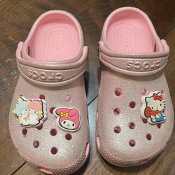 Pink crocs