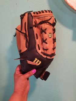 Wilson Baseball Glove..fits on left hand... 14 inch large size...Like new!