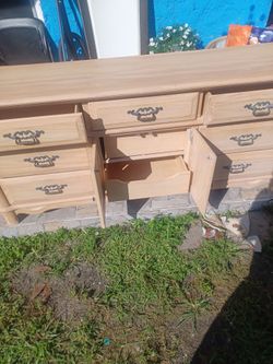 Wood lightweight dresser.