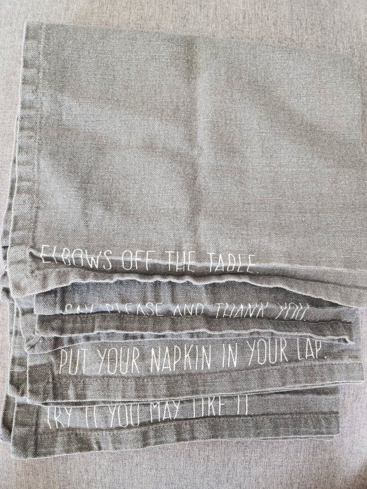 4 Gray Napkins each with phrase