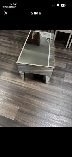 The mirror table has a crack; that is the reason for the price.