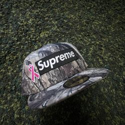 Supreme x New Era “Pink Ribbon Camo Box Logo” Fitted Hat 7 1/2