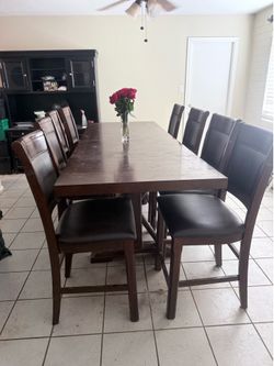 High top kitchen table with eight chairs
