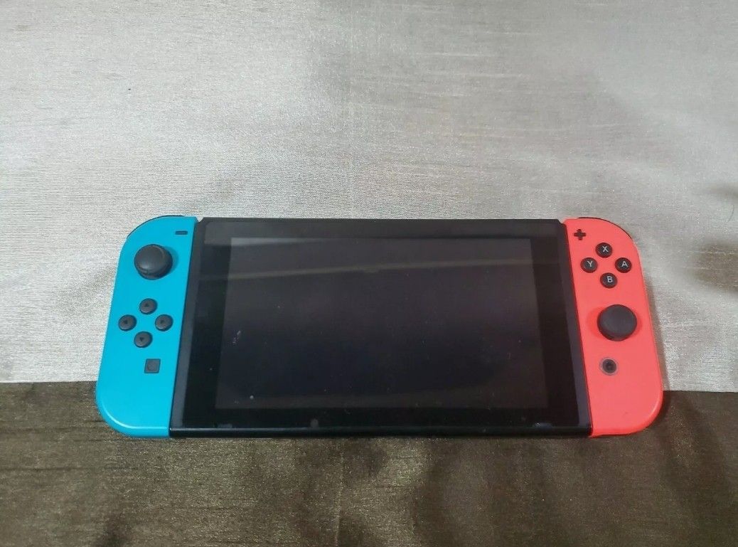 Nintendo switch Console Black With Neon Blue And Neon red Controller