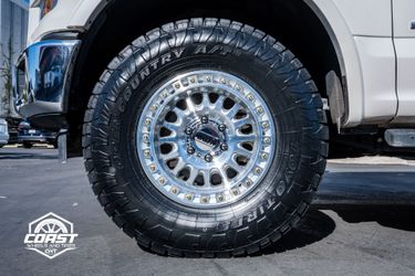 KMC IMS 17x8.5 +25 6x135 W/ 285/75/17 Toyo At3 Wheel Package