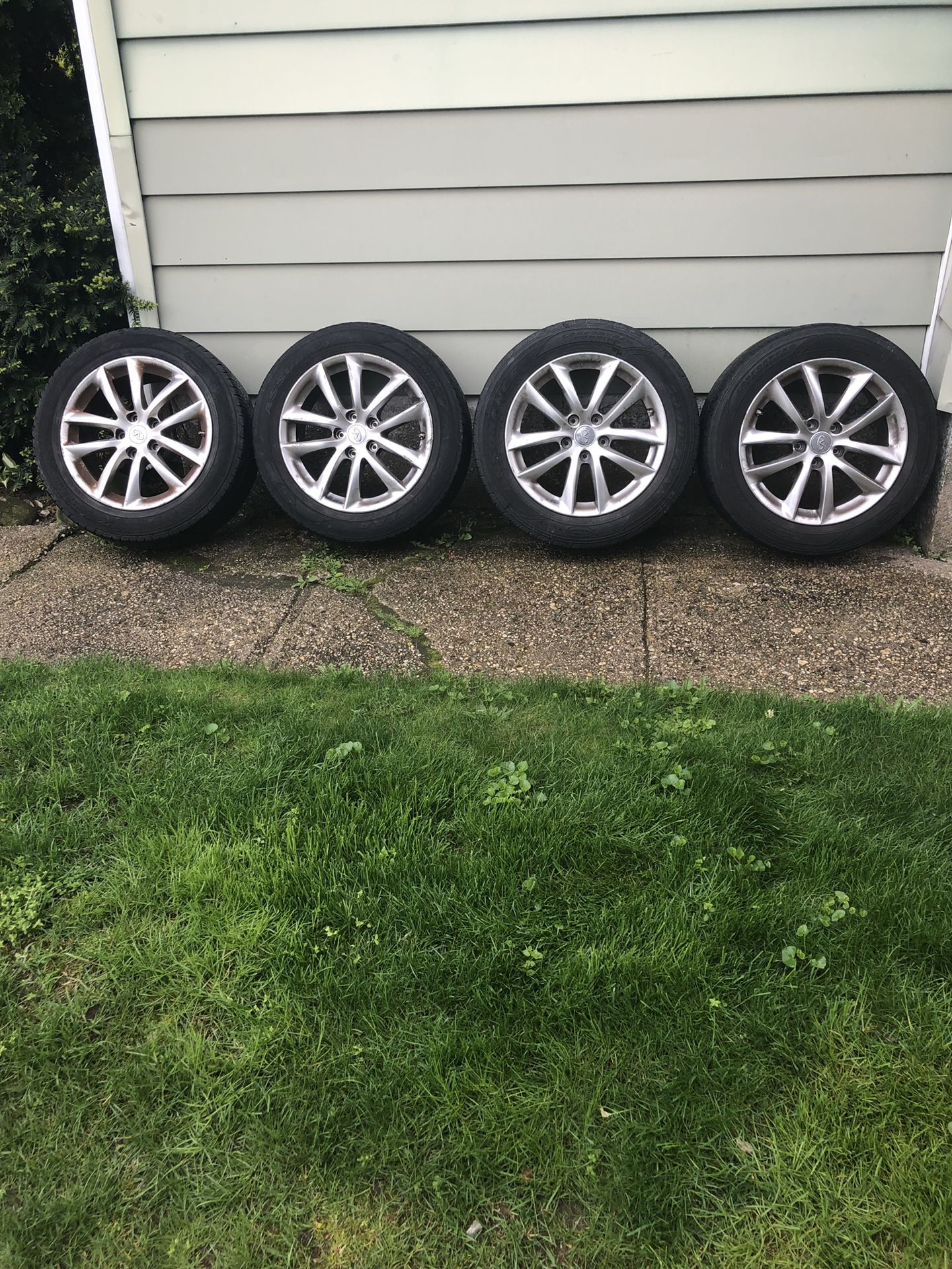 Stock Infiniti rims and tires