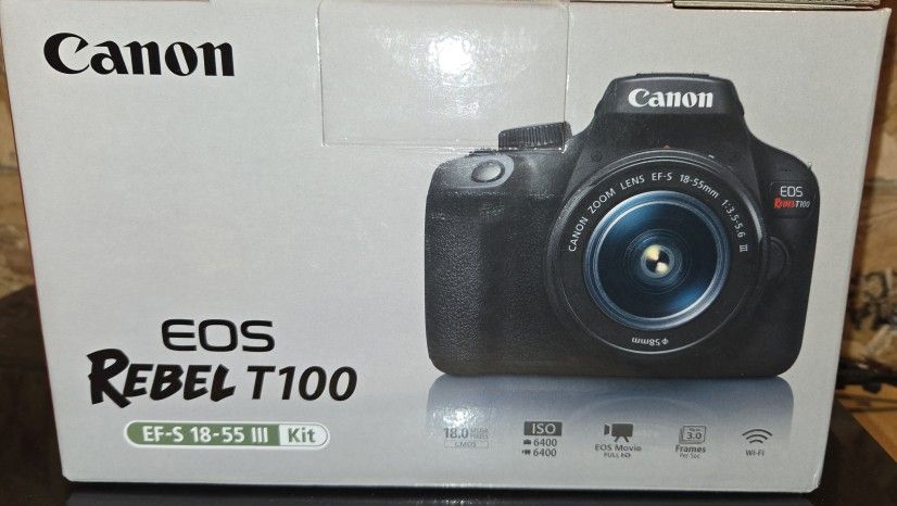 Canon T100