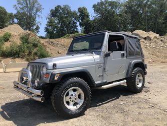 2000 automatic 4x4 6 cyl Jeep Wrangler 4.0 straight six ac cruise good frame