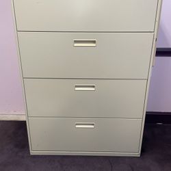 Lateral four drawer filing cabinet with lock in key
