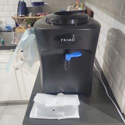 Primo countertop water dispenser top loading  brand new