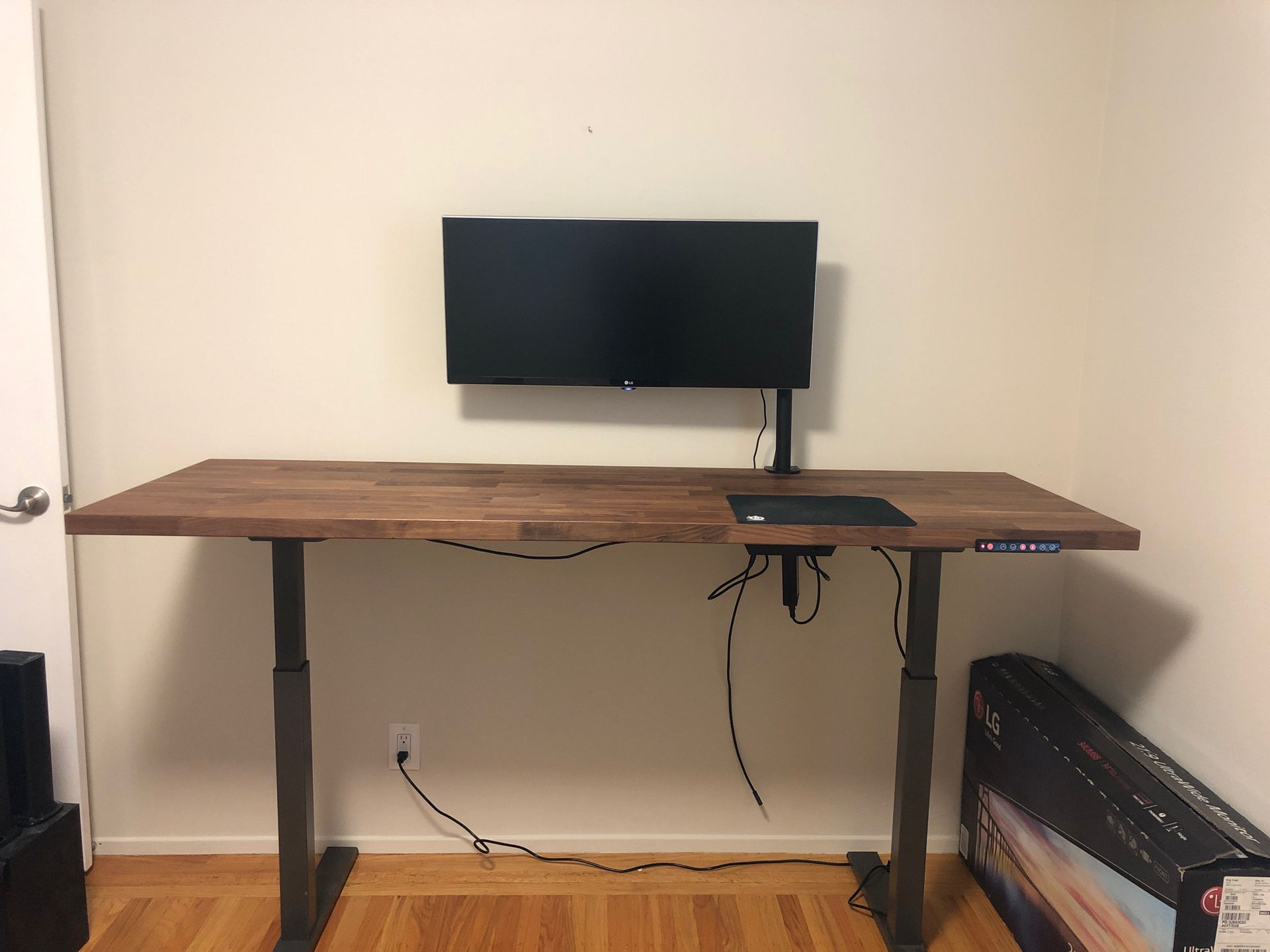 Motorized stand up desk with usb and power outlet
