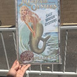 Mermaid’s Cove Metal Sign