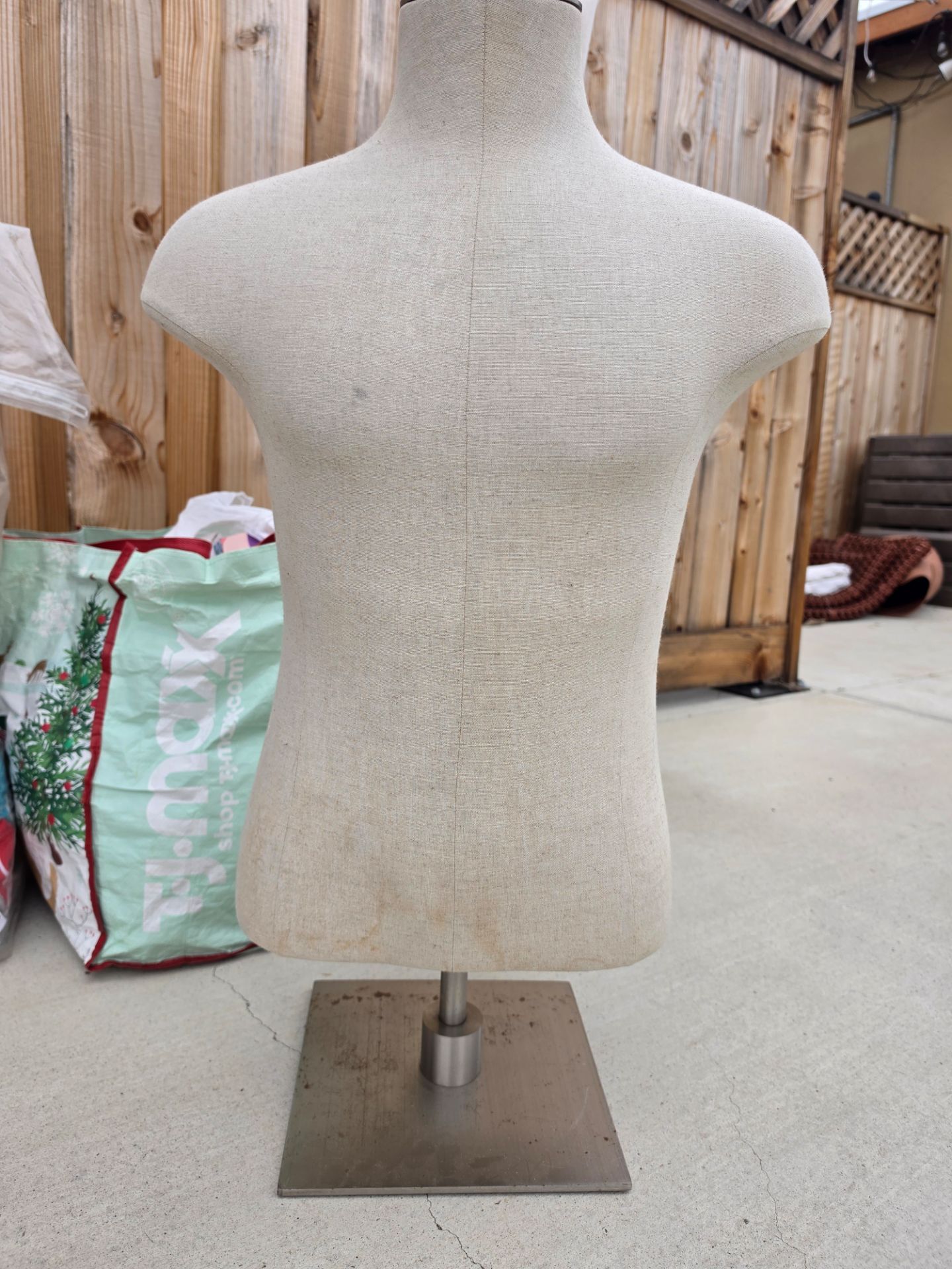 Male mannikin torso on adjustable metsl stand
