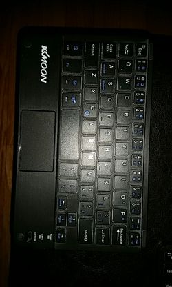 Mini bluetooth wireless Keyboard touchpad for Windows android tablets.