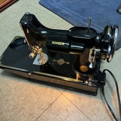 SINGER.   FEATHER LIGHT.  MODEL. 221. 