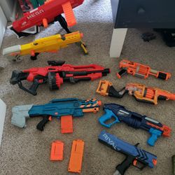 Lot Of 24 Collectible Nerf Guns