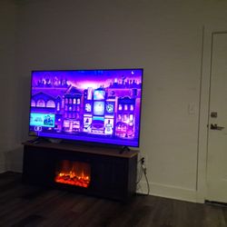 75in LG And Fire Place TV Stand With Storage 
