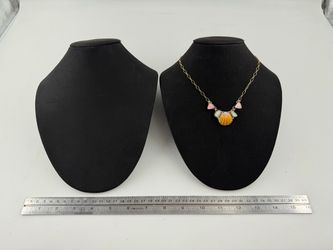 Black jewelry necklace display
