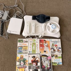 Nintendo Wii Machine, Controllers, Active Accessories & 8 Games  