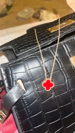 Red clover symbol necklace