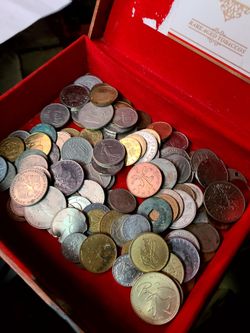 Different foreign coins. $30$