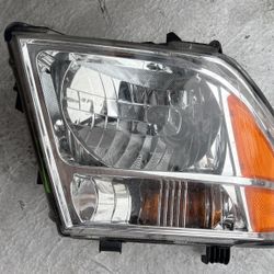 Nissan Pathfinder/ Frontier 05-08 Passenger Side Headlight OE NISSAN 949-615
