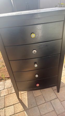 Black Tall Dresser with Decorative Knobs