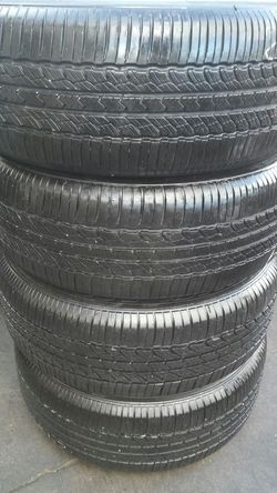 (4) P245/55R19 Toyo Open Country 85%