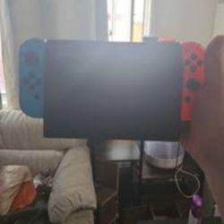 Nintendo Switch, Games, Extra Memory Card, And Brand New Switch Headphones