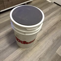 Bucket of baseballs