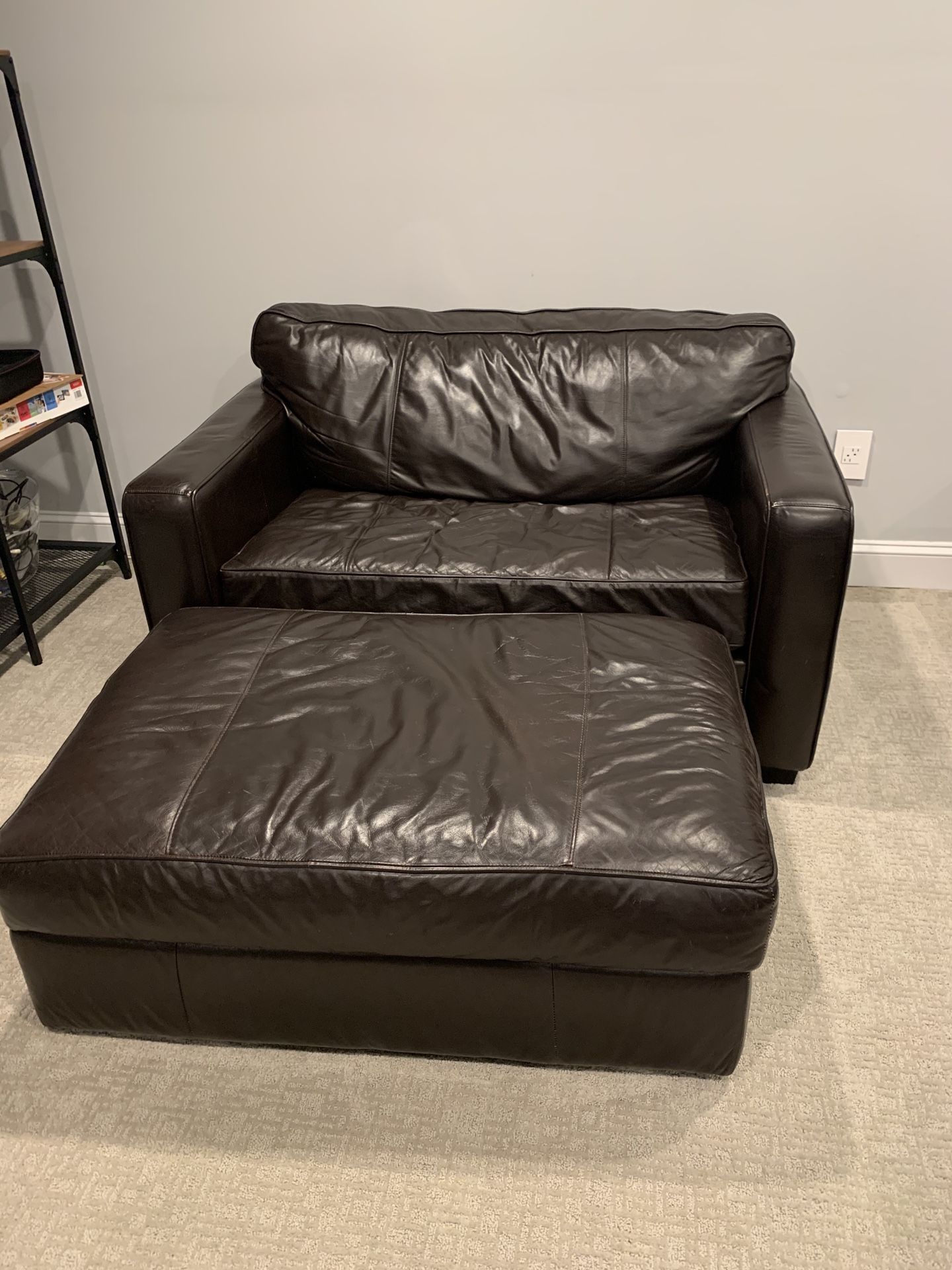 Havertys Leather oversized chair with twin bed pull out