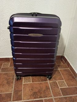 Purple Samsonite suitcase great condition