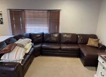 Large Dark Brown Leather Sectional Couch with Pull-Out Bed & Recliner
