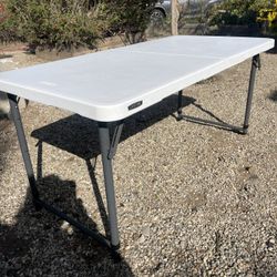 Lifetime 4 Ft. One Hand Adjustable Heigth-in Half Resin Table 