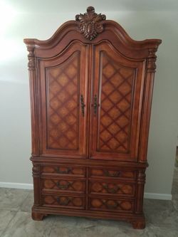 Two piece entertainment armoir