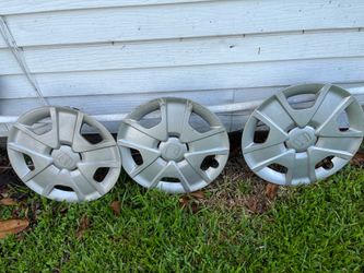 Three factory OEM hubcaps off my 2013 Honda fit