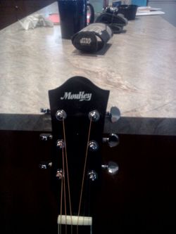Moukey acoustic guitar