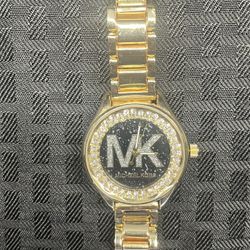 Women’s Michael Kors Black and Gold Stainless Steel Watch 