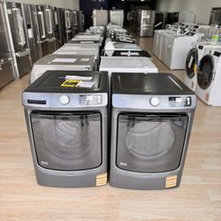 Brand-new Maytag Smart Pet Pro Washer (5.0 cu. ft.) and Gas Dryer (7.4 cu. ft.) in Midnight Steel.