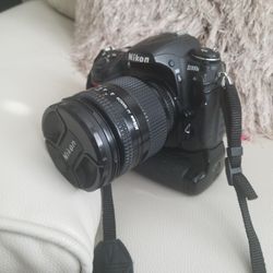 Nikon D300 S W/video Nikon Lens  28-200 motor drive.