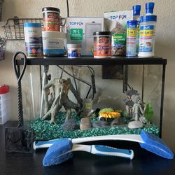 Fish tank aquarium with tons of accessories. Check my other listings for more great items!