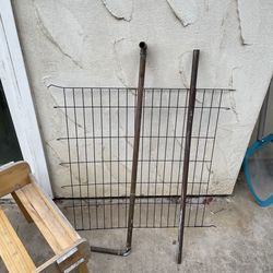 2 copper pipes, grill and wood stand