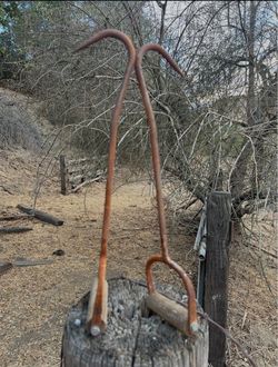 Antique rustic hay hooks