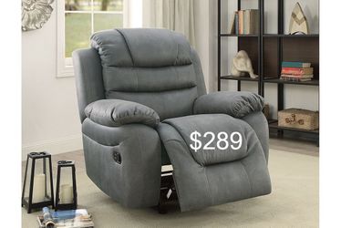 New beautiful rocker recliner, super plush seating upholstered in a breathable fabric