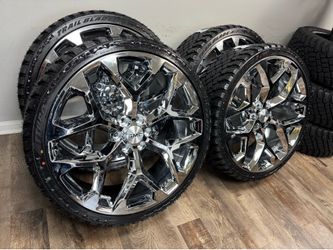 NEW 26 inch chrome snowflakes wrapped in 305/30r26 atturo xt tires