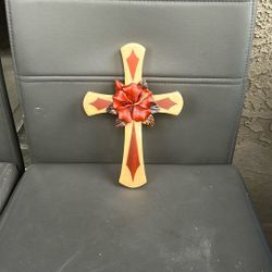 Hawaiian cross made out of Rosewood and curved with a plumeria flower
